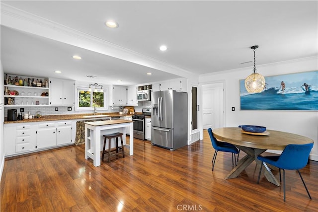 2805 Via Montecito, San Clemente, CA 92672 - kitchen featuring stainless steel appliances, white cabinetry, crown molding, open shelves, and recessed lighting