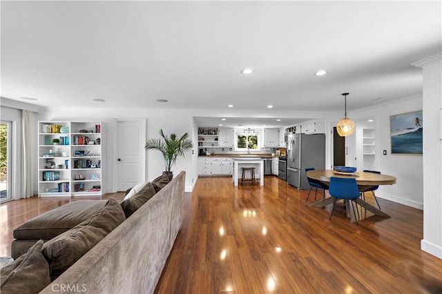 2805 Via Montecito, San Clemente, CA 92672 - living area featuring recessed lighting, dark wood finished floors, and built in features