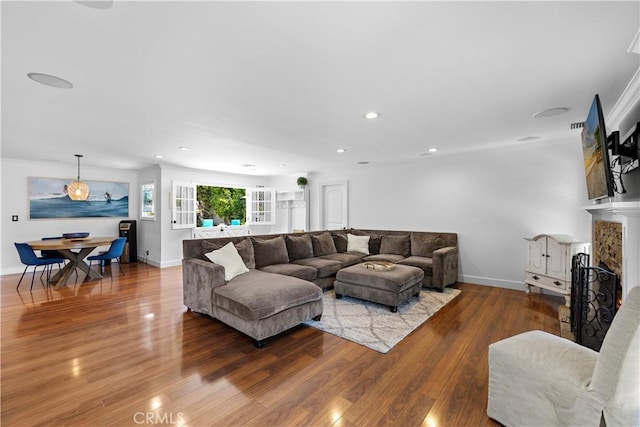 2805 Via Montecito, San Clemente, CA 92672 - living room with wood finished floors, recessed lighting, and a stone fireplace