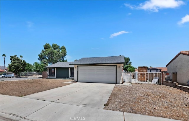 2294 Daisy Way, Hemet, CA 92545 - single story home with a garage, concrete driveway, and a gate