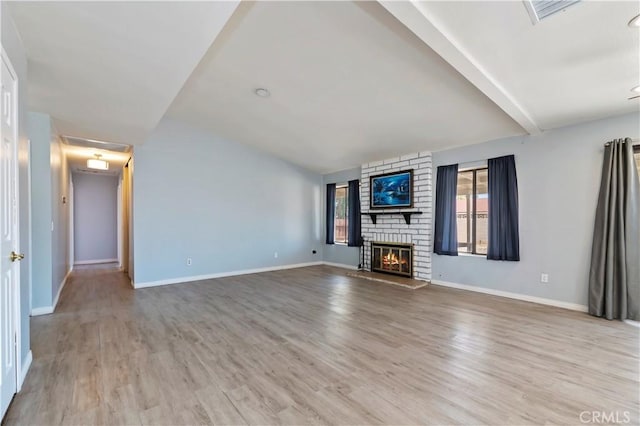 2294 Daisy Way, Hemet, CA 92545 - unfurnished living room with light wood finished floors and a fireplace