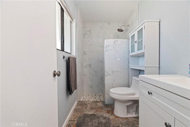 2294 Daisy Way, Hemet, CA 92545 - bathroom with a marble finish shower, vanity, and stone finish floors