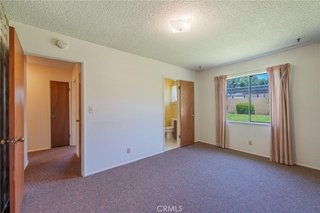 2001 W Jan Way, Santa Ana, CA 92704 - unfurnished bedroom with carpet floors, a textured ceiling, and ensuite bathroom
