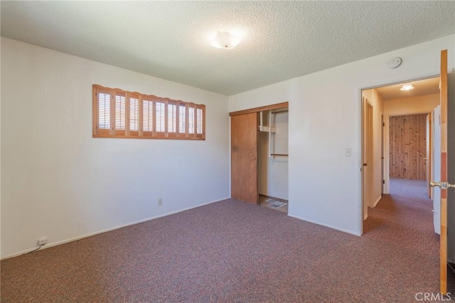 2001 W Jan Way, Santa Ana, CA 92704 - unfurnished bedroom with carpet flooring, a closet, and a textured ceiling