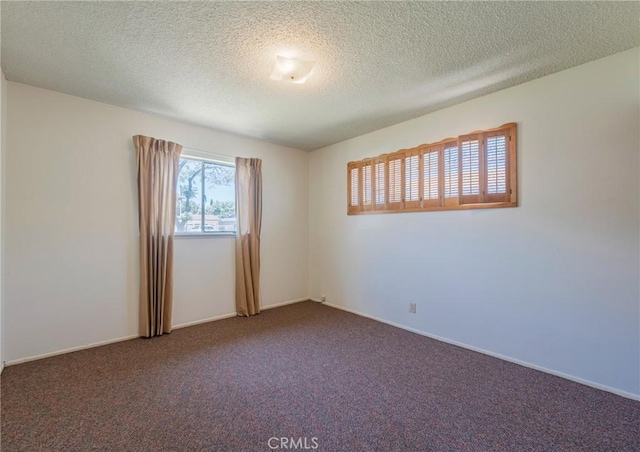 2001 W Jan Way, Santa Ana, CA 92704 - empty room featuring carpet and a textured ceiling
