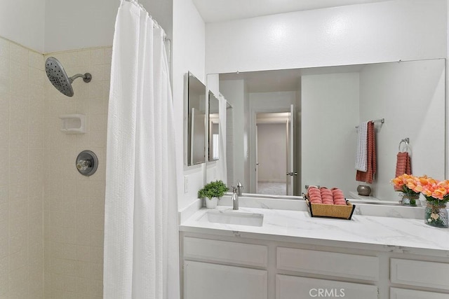 12400 Montecito Rd Unit 222, Seal Beach, CA 90740 - full bathroom featuring tiled shower and vanity