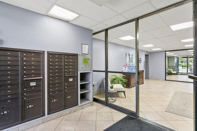 12400 Montecito Rd Unit 222, Seal Beach, CA 90740 - view of property's community featuring a drop ceiling, mail area, and a textured wall
