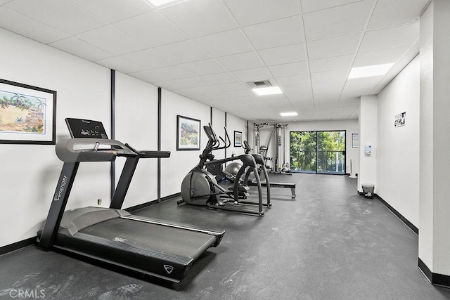 12400 Montecito Rd Unit 222, Seal Beach, CA 90740 - gym featuring baseboards and a paneled ceiling
