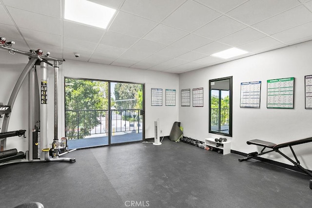 12400 Montecito Rd Unit 222, Seal Beach, CA 90740 - workout area featuring a drop ceiling and baseboards