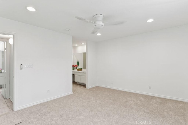 12400 Montecito Rd Unit 222, Seal Beach, CA 90740 - unfurnished room with light carpet, ceiling fan, and recessed lighting