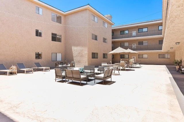 12400 Montecito Rd Unit 222, Seal Beach, CA 90740 - surrounding community with an outdoor living space and a patio area