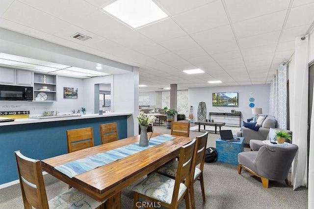 12400 Montecito Rd Unit 222, Seal Beach, CA 90740 - carpeted dining room featuring plenty of natural light and a drop ceiling