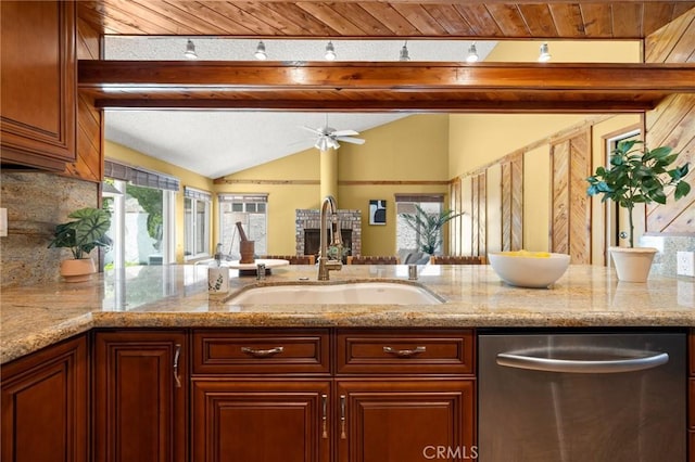 26017 Redbluff Dr, Calabasas, CA 91302 - kitchen with dishwasher, light stone counters, and ceiling fan