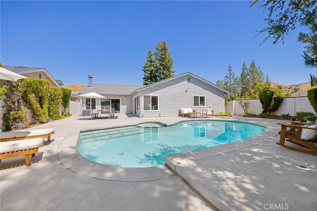 26017 Redbluff Dr, Calabasas, CA 91302 - view of pool with a patio and a fenced backyard