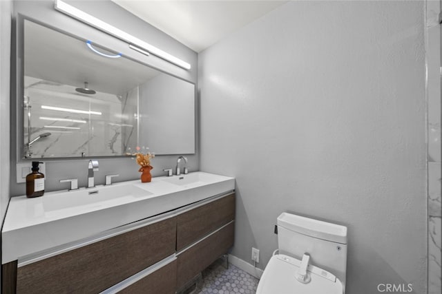 9778 Via Roma, Burbank, CA 91504 - full bath with a marble finish shower, double vanity, and tile patterned flooring