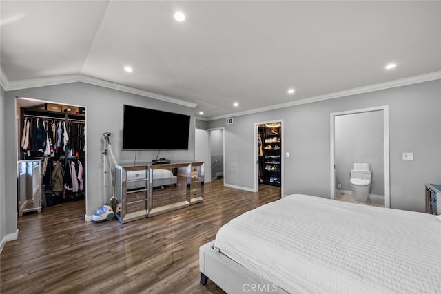 9778 Via Roma, Burbank, CA 91504 - bedroom featuring a walk in closet, recessed lighting, wood finished floors, ornamental molding, and connected bathroom