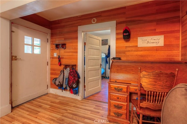 217 N Plumas St, Willows, CA 95988 - living area with wood walls and light wood-type flooring