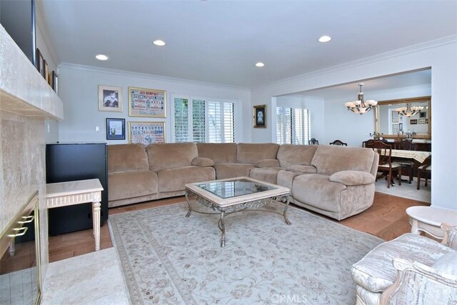 17000 Addison St, Encino, CA 91316 - living area featuring a chandelier, wood finished floors, ornamental molding, and recessed lighting