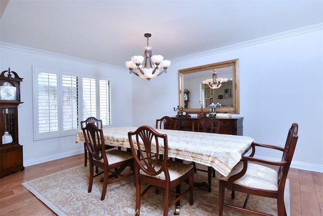 17000 Addison St, Encino, CA 91316 - dining area featuring a chandelier, crown molding, and light wood finished floors