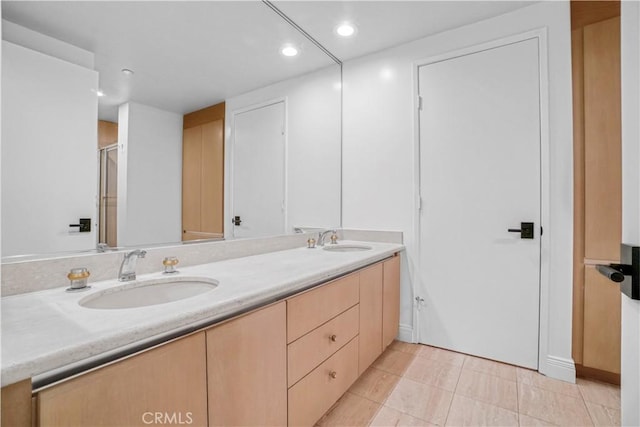 850 E Ocean Blvd Unit 1604, Long Beach, CA 90802 - full bathroom with double vanity, recessed lighting, a shower with shower door, and tile patterned floors