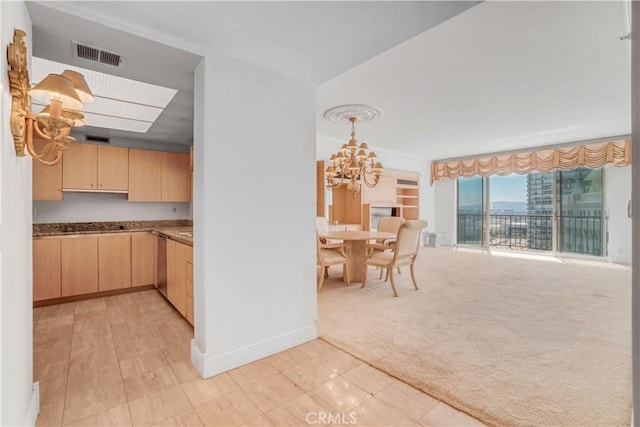 850 E Ocean Blvd Unit 1604, Long Beach, CA 90802 - dining room with a chandelier and light colored carpet