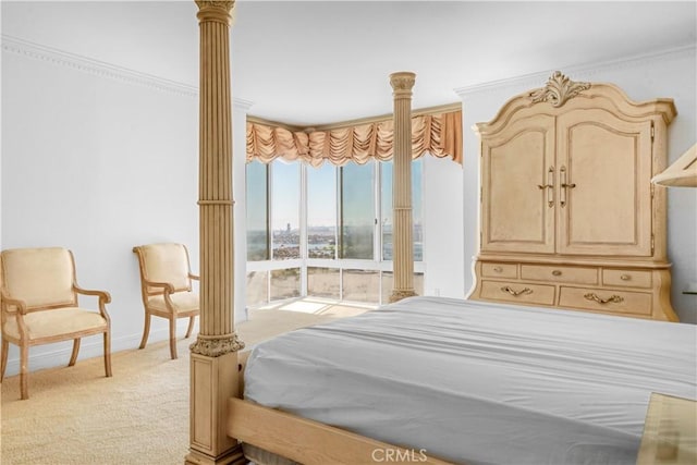 850 E Ocean Blvd Unit 1604, Long Beach, CA 90802 - bedroom with decorative columns, light colored carpet, access to outside, and ornamental molding
