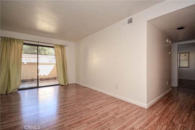 1130 W Blaine St, Riverside, CA 92507 - spare room featuring wood finished floors and baseboards