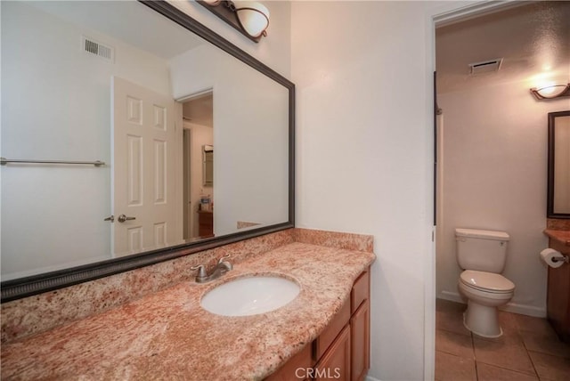 1130 W Blaine St, Riverside, CA 92507 - bathroom with vanity and tile patterned floors
