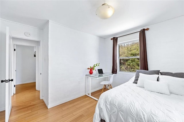 1544 3rd St, Manhattan Beach, CA 90266 - bedroom with light wood finished floors and ornamental molding