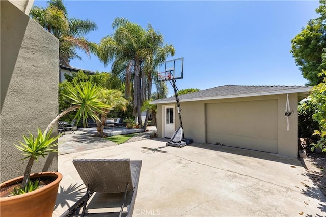 1544 3rd St, Manhattan Beach, CA 90266 - view of patio / terrace with a garage and driveway