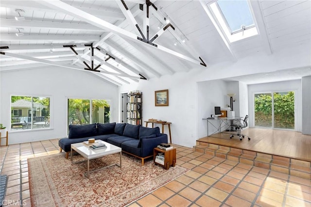 1544 3rd St, Manhattan Beach, CA 90266 - tiled living area featuring a skylight, a desk, plenty of natural light, rail lighting, and wood ceiling