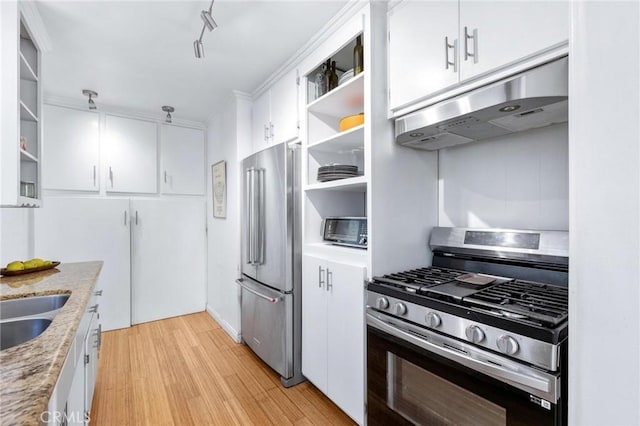 1544 3rd St, Manhattan Beach, CA 90266 - kitchen featuring appliances with stainless steel finishes, under cabinet range hood, open shelves, white cabinetry, and light wood-style floors