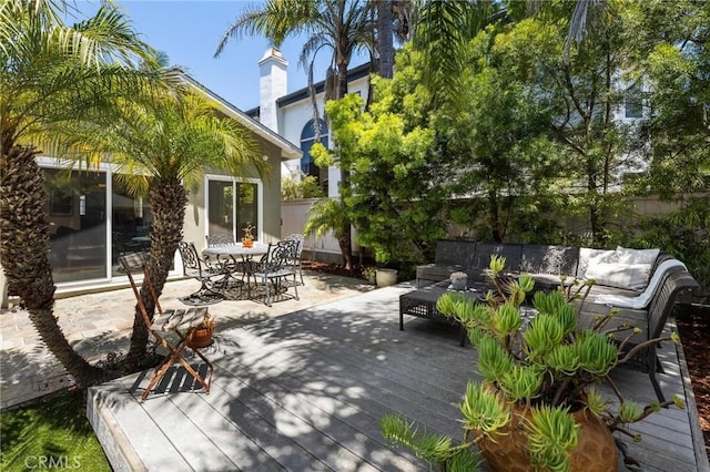 1544 3rd St, Manhattan Beach, CA 90266 - view of patio with a wooden deck, outdoor lounge area, and outdoor dining space