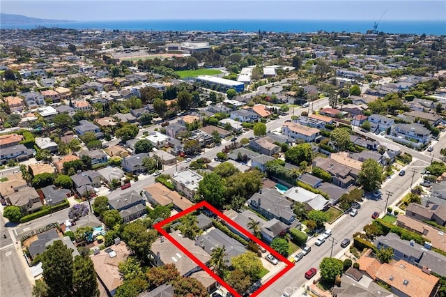 1544 3rd St, Manhattan Beach, CA 90266 - aerial view of residential area with property parcel outlined and a large body of water