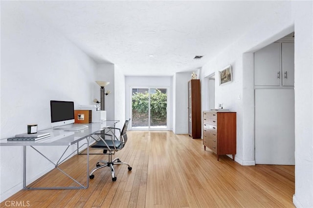1544 3rd St, Manhattan Beach, CA 90266 - office with light wood finished floors and a textured ceiling