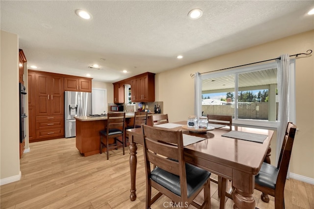 1219 N Van Buren St, Placentia, CA 92870 - dining space featuring light wood-style floors and recessed lighting