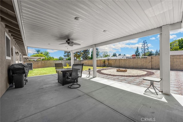 1219 N Van Buren St, Placentia, CA 92870 - fenced backyard featuring a fire pit, grilling area, a patio area, and ceiling fan