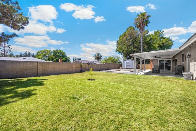 1219 N Van Buren St, Placentia, CA 92870 - fenced backyard with a ceiling fan, a shed, and a patio