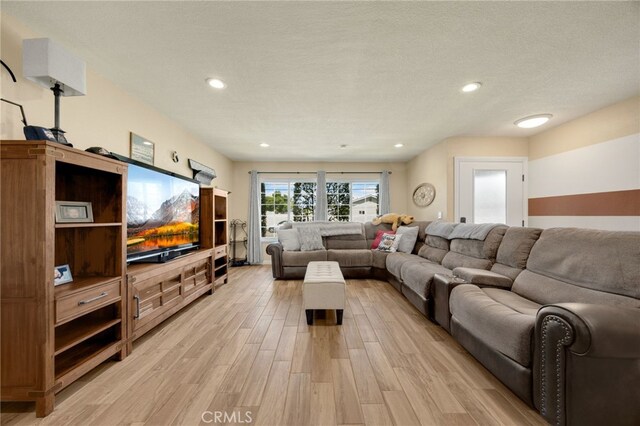 1219 N Van Buren St, Placentia, CA 92870 - living area featuring light wood-style flooring and recessed lighting