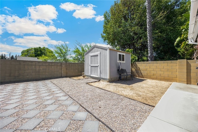 1219 N Van Buren St, Placentia, CA 92870 - fenced backyard with a patio and a storage unit