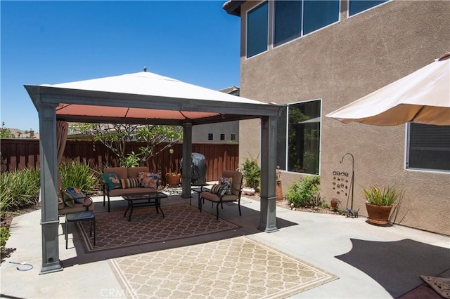 8718 Snowmass Peak Way, Riverside, CA 92508 - fenced backyard featuring a gazebo, outdoor lounge area, and a patio area
