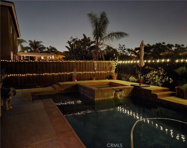 8718 Snowmass Peak Way, Riverside, CA 92508 - view of swimming pool featuring a fenced backyard and a pool with connected hot tub