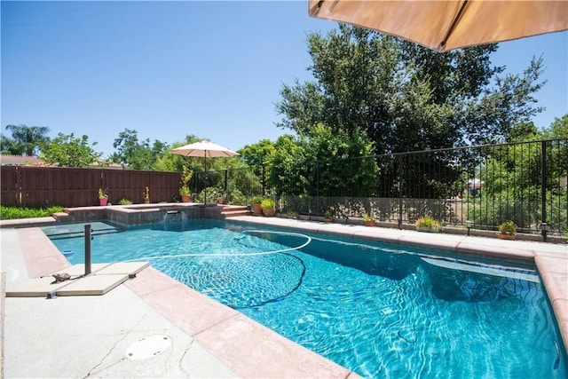 8718 Snowmass Peak Way, Riverside, CA 92508 - view of swimming pool with a fenced backyard and a hot tub