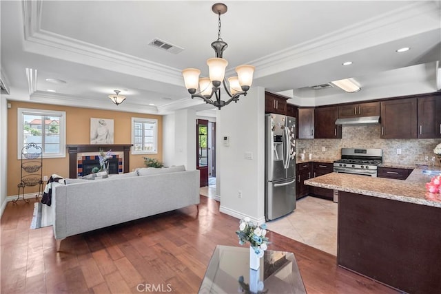 1128 Huntington Dr Unit C, South Pasadena, CA 91030 - living area with a tray ceiling, a chandelier, crown molding, light wood-type flooring, and recessed lighting