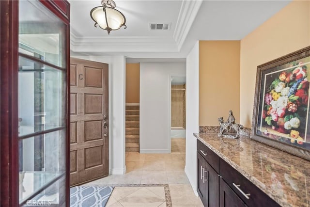 1128 Huntington Dr Unit C, South Pasadena, CA 91030 - foyer entrance featuring light tile patterned floors, stairs, crown molding, and inlaid floor details