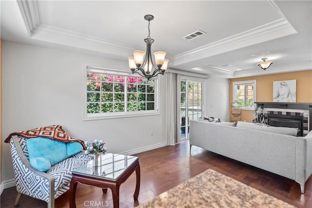 1128 Huntington Dr Unit C, South Pasadena, CA 91030 - living room featuring a tray ceiling, ornamental molding, a chandelier, dark wood-style floors, and a fireplace