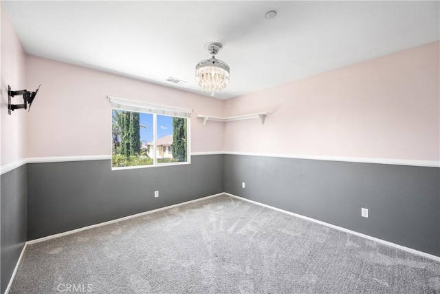 15353 Isabel Ln, Fontana, CA 92336 - carpeted empty room with a chandelier and baseboards