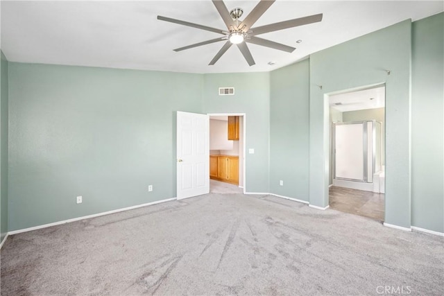 15353 Isabel Ln, Fontana, CA 92336 - unfurnished bedroom with light colored carpet, high vaulted ceiling, connected bathroom, and ceiling fan