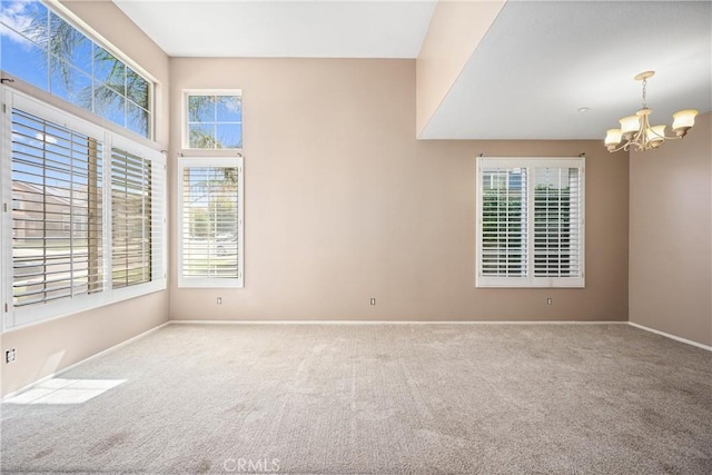 15353 Isabel Ln, Fontana, CA 92336 - unfurnished room featuring a chandelier and carpet floors