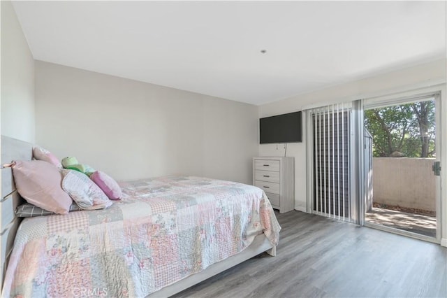 3623 Legato Ct, Pomona, CA 91766 - bedroom with access to exterior and wood finished floors